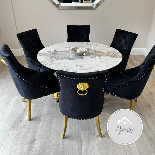 Elegance and Luxury: The Capello Gold White and Grey Marble Circular Dining Table with Black and Gold Leo Chairs