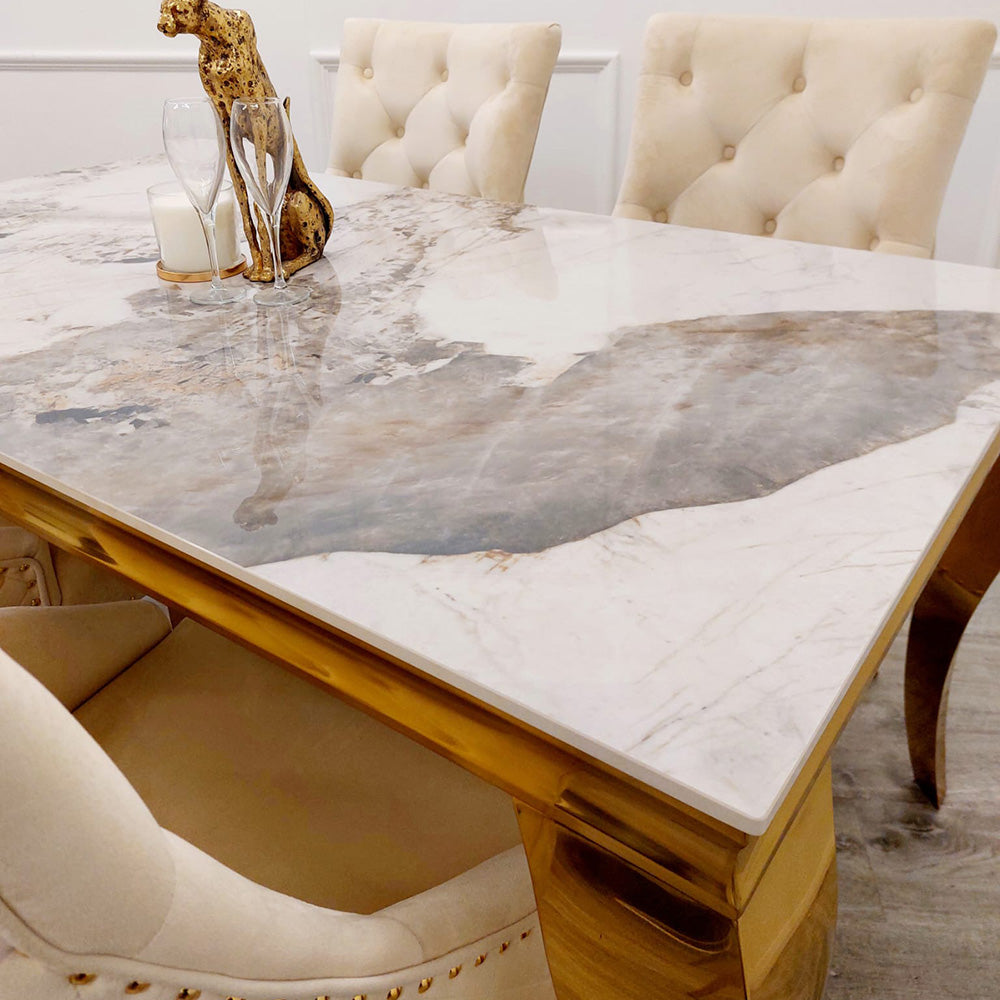 Riviera Gold Pandora Marble Dining Table with Cream and Gold Leo Chairs