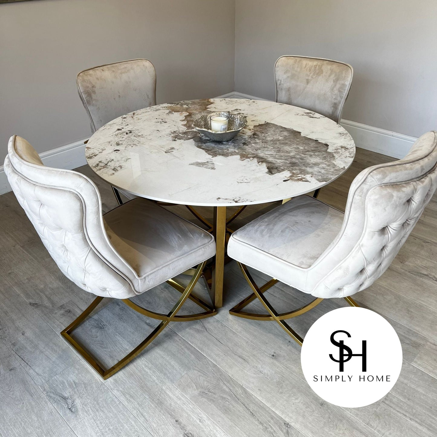 Natalia Circular White Marble Dining Table with Pavia Cream and Gold Chairs