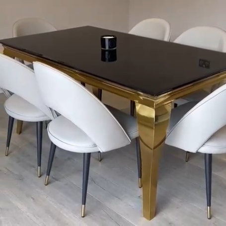 Riviera Gold Black Glass Dining Table with Grey Adrianna Chairs