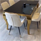 Riviera Gold Black Glass Dining Table with Cream Milano Chairs