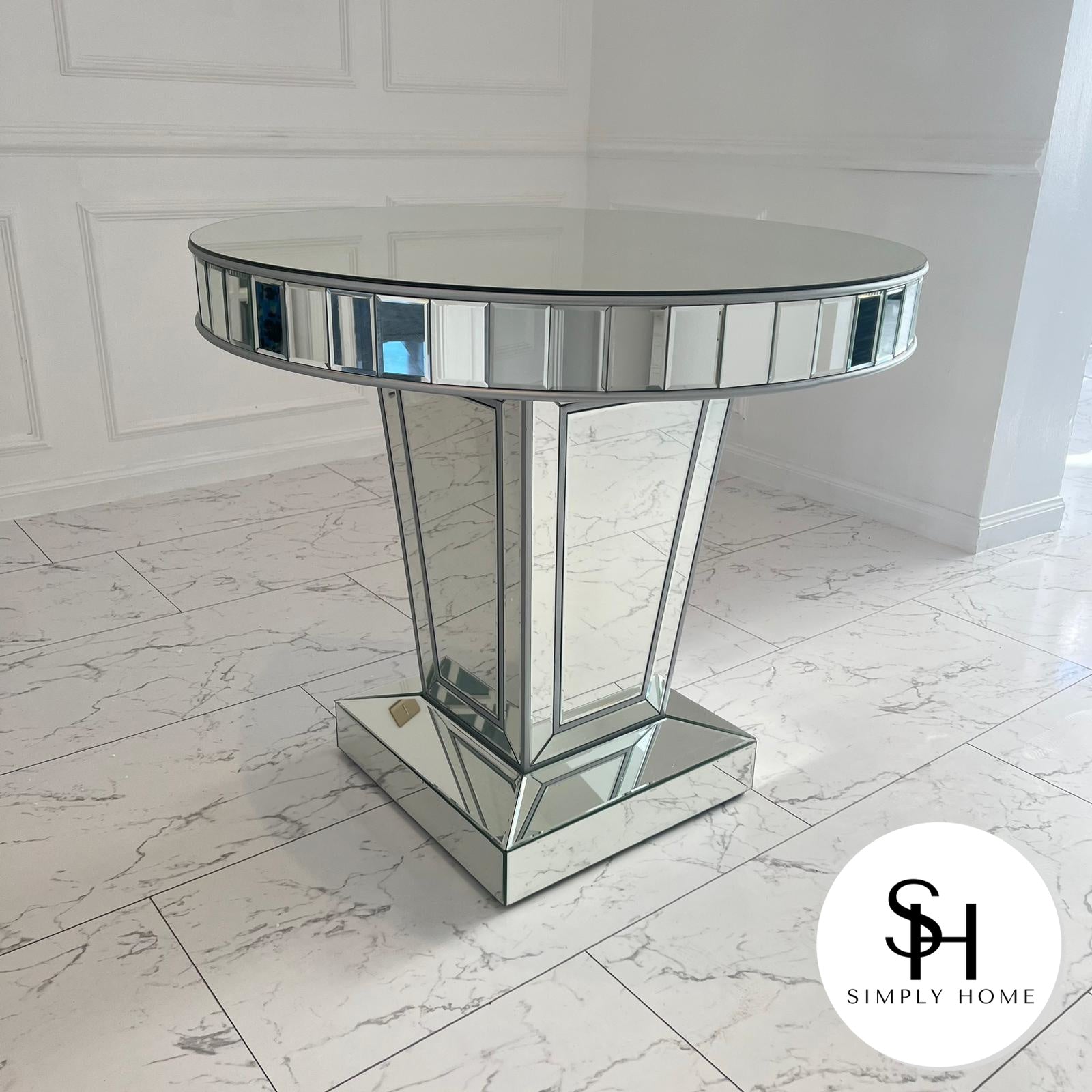 Mirrored store pedestal table