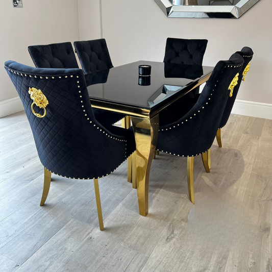 Riviera Gold Black Glass Dining Table with Black Leo Gold Chairs